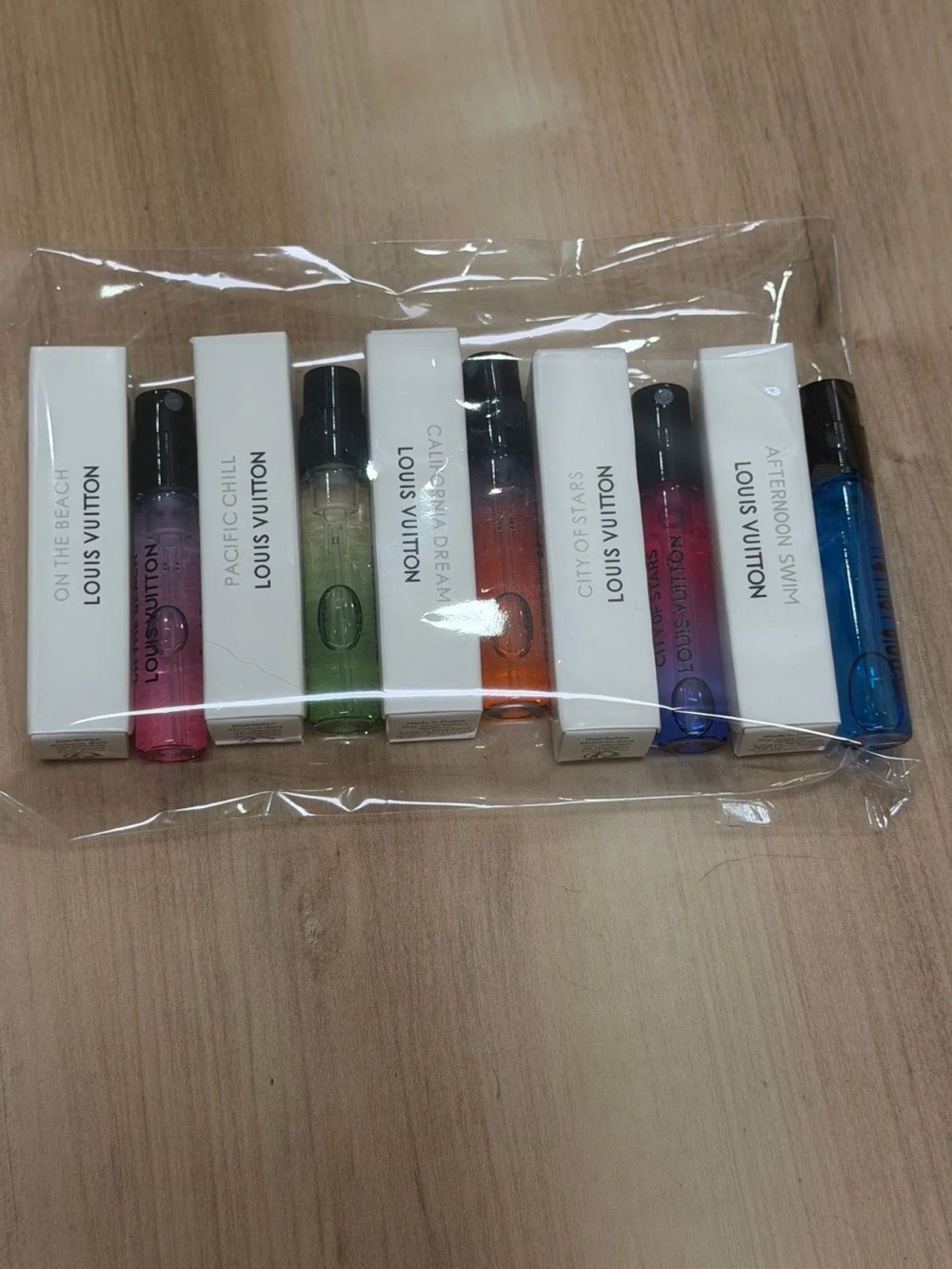 AUTH. Louis Vuitton Women's Fragrance Vial Set Pink, Green, Orange, Purple, Blue